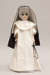 Doll wearing habit worn by Sinsinawa Dominican Sisters