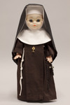 Doll wearing habit worn by Sisters of Saint Francis of Perpetual Adoration
