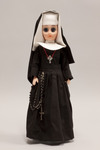 Doll wearing habit worn by Sisters of the Holy Spirit and Mary Immaculate