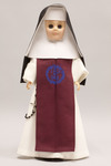 Doll wearing habit worn by Sisters of the Incarnate Word and Blessed Sacrament