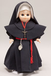 Doll wearing habit worn by Sisters of the Most Precious Blood