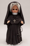 Doll wearing habit worn by the Sisters of Charity of Our Lady of Mercy