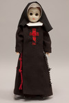 Doll wearing habit worn by Franciscan Sisters of the Poor  of Cincinnati, Ohio