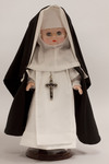 Doll wearing habit worn by Eucharistic Missionaries of Saint Dominic