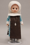 Doll wearing habit worn by Handmaids of Mary Immaculate