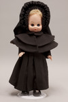 Doll wearing habit worn by Society of Saint Teresa of Jesus