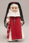 Doll wearing habit worn by Sisters Adorers of the Precious Blood