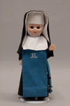 Doll wearing habit worn by Daughters of Mary and Joseph