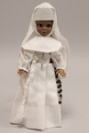 Doll wearing habit worn by a novice of the Sisters of the Holy Family