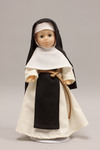 Doll wearing habit worn by Cistercian Sisters