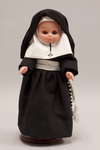 Doll wearing habit worn by Marianist Sisters