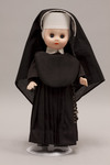 Doll wearing habit worn by Daughters of the Cross