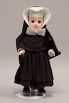 Doll wearing habit worn by Sisters of Christian Charity