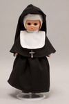 Doll wearing habit worn by Salesian Sisters of Saint John Bosco