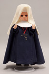 Doll wearing habit worn by Holy Spirit Missionary Sisters