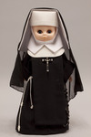 Doll wearing habit worn by Sisters of the Blessed Sacrament