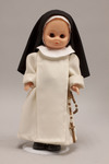 Doll wearing habit worn by Dominican Sisters