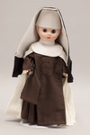 Doll wearing habit worn by Carmelite Sisters of the Divine Heart of Jesus