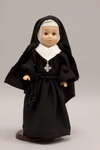 Doll wearing habit worn by Sisters of the Resurrection
