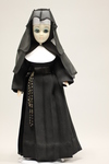 Doll wearing habit worn by Sisters of the Presentation of the Blessed Virgin Mary