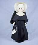 Doll wearing habit worn by Sisters of the Holy Cross