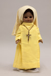Doll wearing habit worn by Daughters of the Most Blessed Trinity