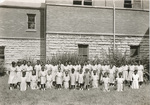 Group Photo of 40 Students, Early Teens and Younger, outside Chapel by Sisters of the Good Shepherd