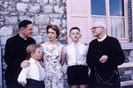 Gilberte Degeimbre, her two sons, Rev. Debergh, and Rev. Gaston Maes