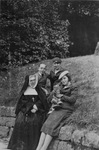 Mother Theophile and the Voisin children, Gilberte, Fernande, and Albert, 1937