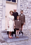 Father Gaston Maes with Gilberte Degeimbre and her two sons, 1960