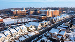 Background Image: Aerial View of Campus from the South after a Light Snow