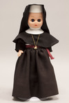 Doll wearing habit worn by Sisters Adorers of the Most Precious Blood
