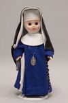 Doll wearing habit worn by Daughters of Mary of the Immaculate Conception