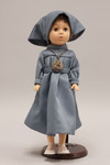 Doll wearing habit of an unidentified religious order