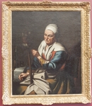 Woman Spinning by Nicolaes Maes