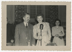 Man and woman at microphone
