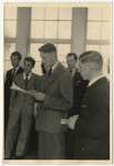 Man reading a paper at the Baltic University in Exile