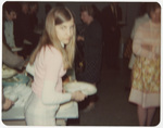 Girl holding plate of food at the 1963 Boston National Convention