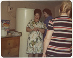 Three women laugh in a kitchen at 1963 Boston National Convention