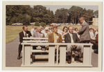 People seated on benches