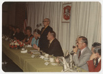 Speaking at a dinner