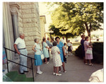 People standing outside a church