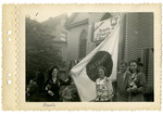 People with Detroit flag at the 1949 Knights of Lithuania National Convention