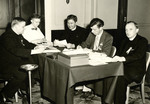 Men gathered at a table